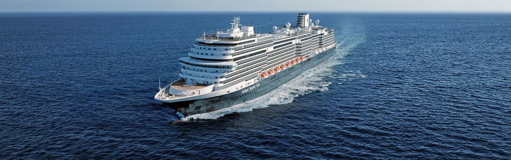 Holland America Line cruise ship sailing at sea with automated VacationCRM pre-trip and shore excursion client emails